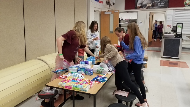 SMS Helping Hawks create blessing bags